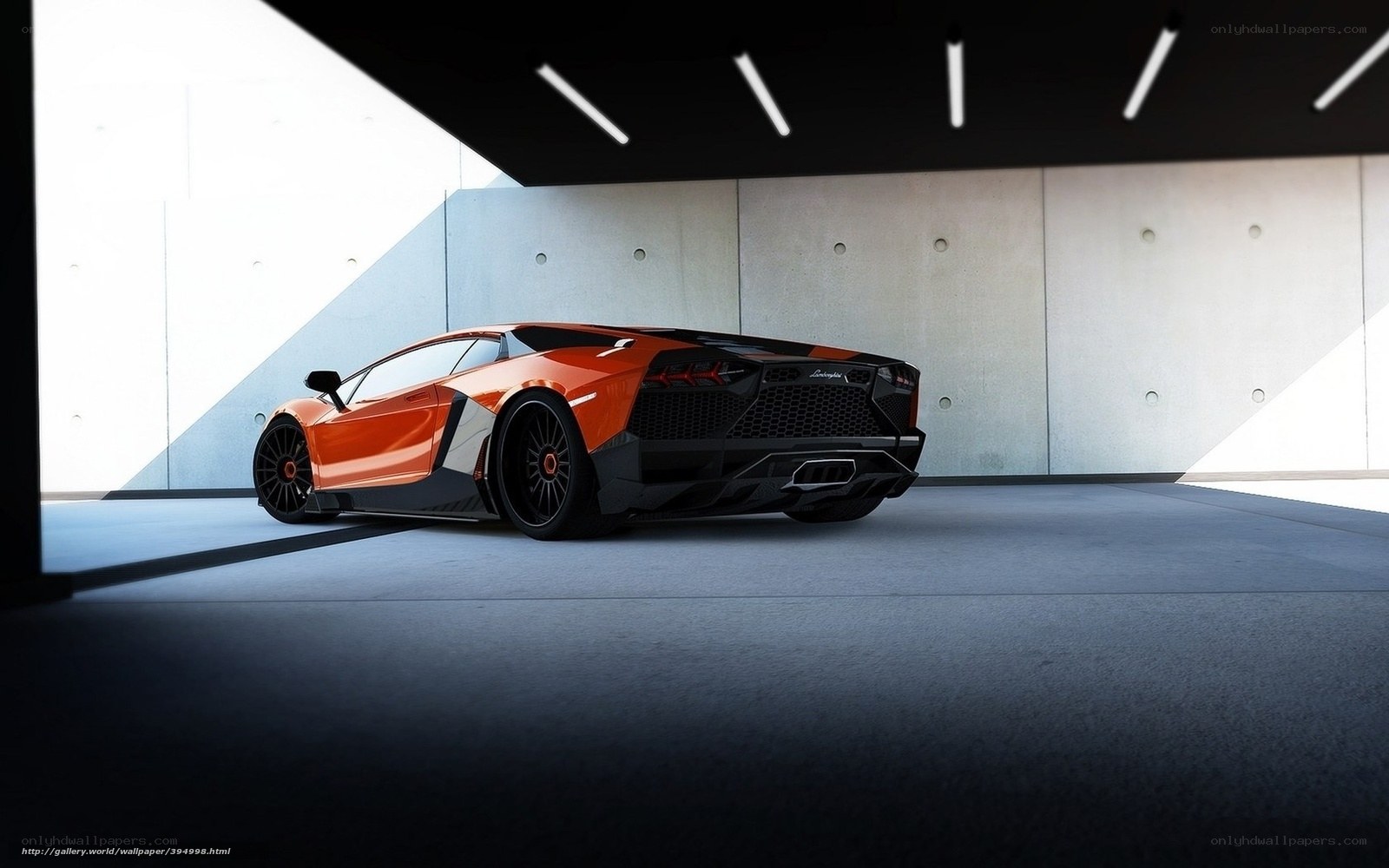 Orange Lamborghini in modern garage