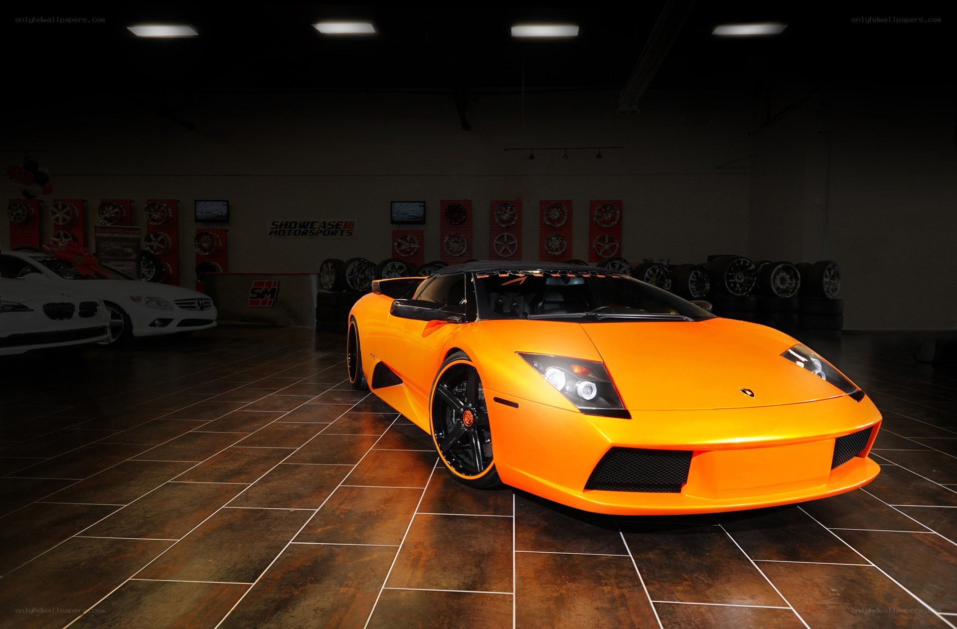 Orange Lamborghini in showroom