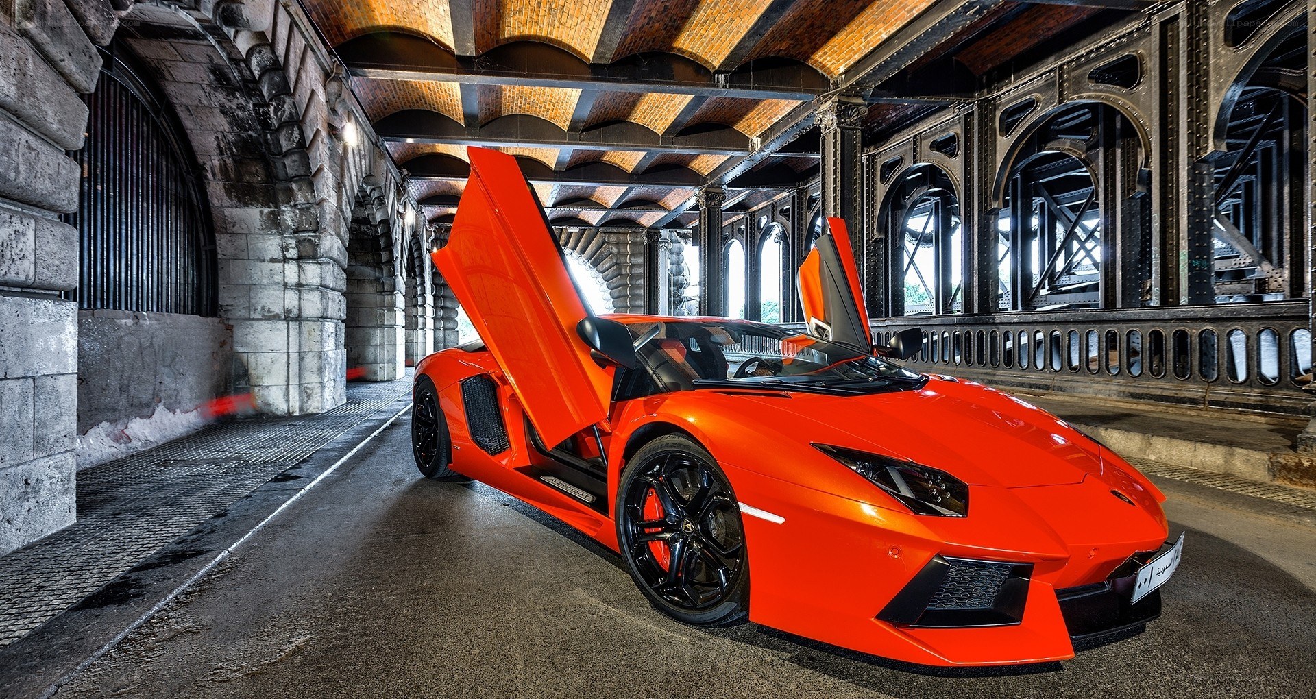 Orange Lamborghini in tunnel