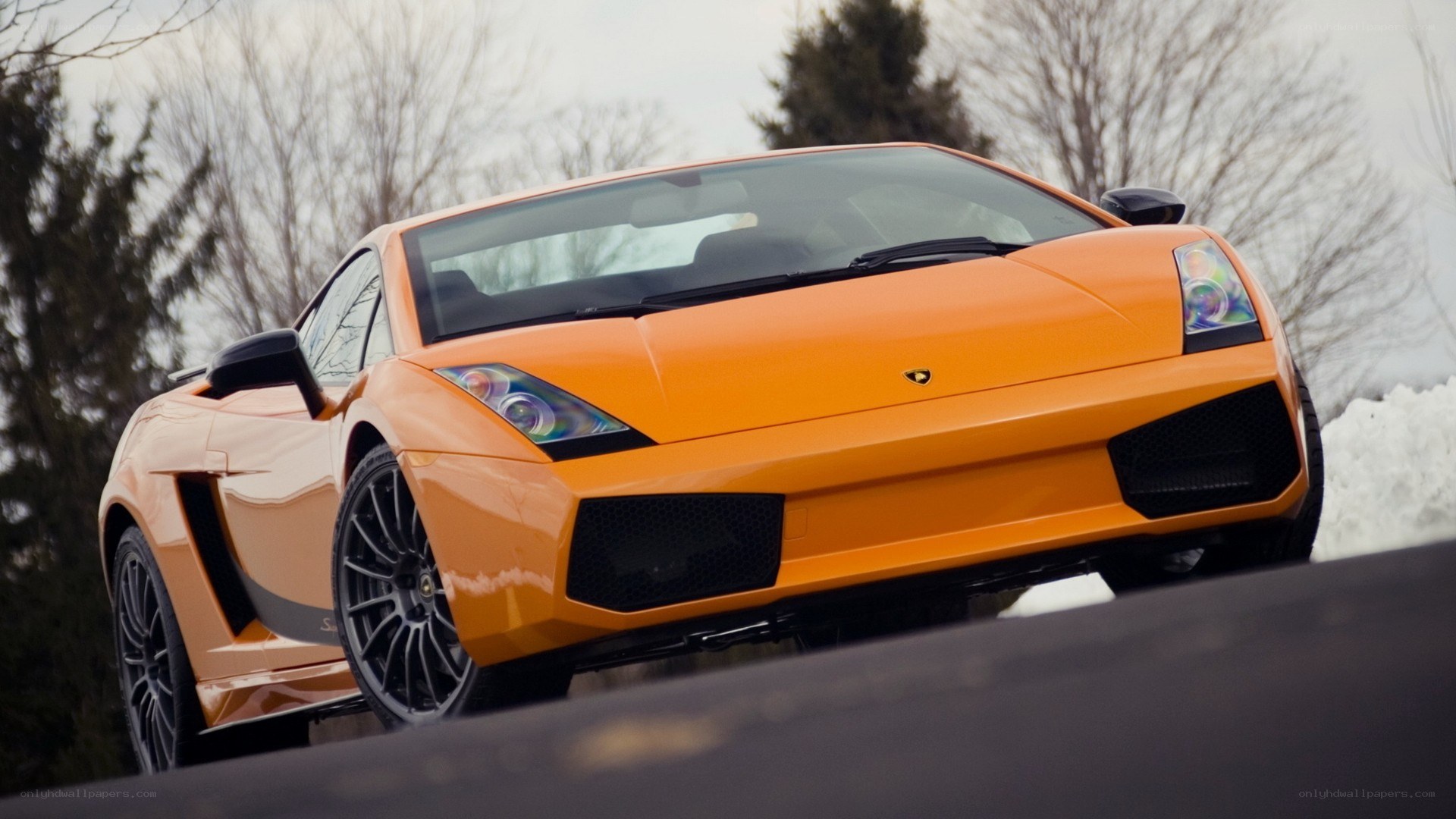 orange Lamborghini in winter