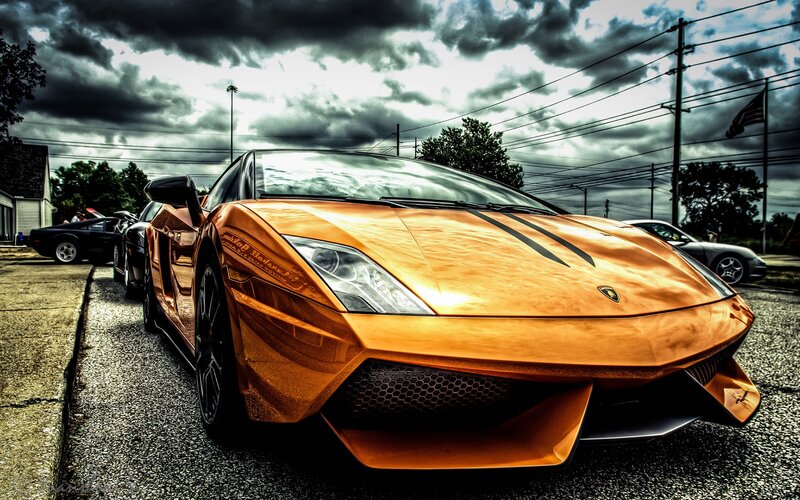 Orange Lamborghini on a cloudy day