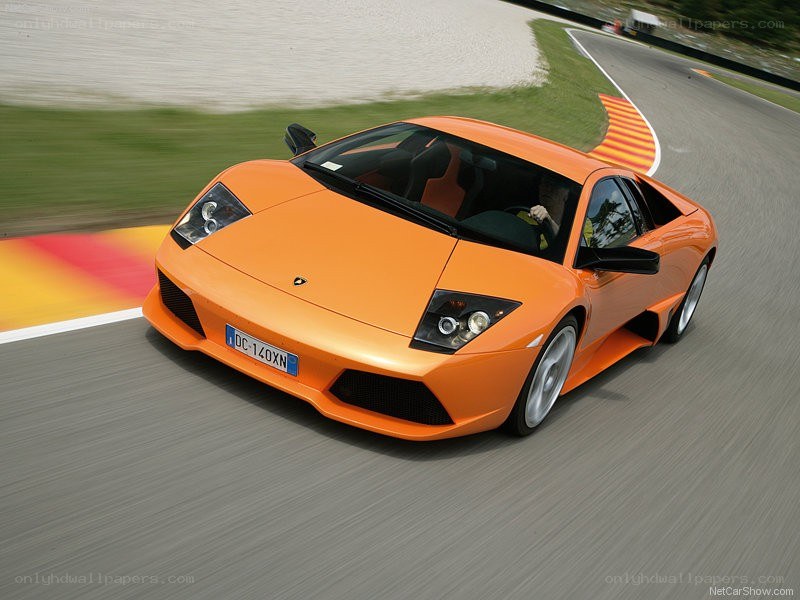 Orange Lamborghini on a racetrack
