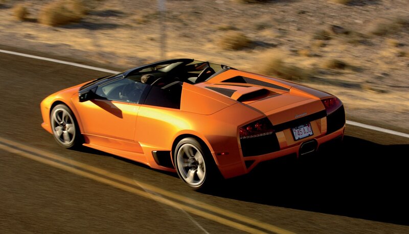 Orange Lamborghini on desert road