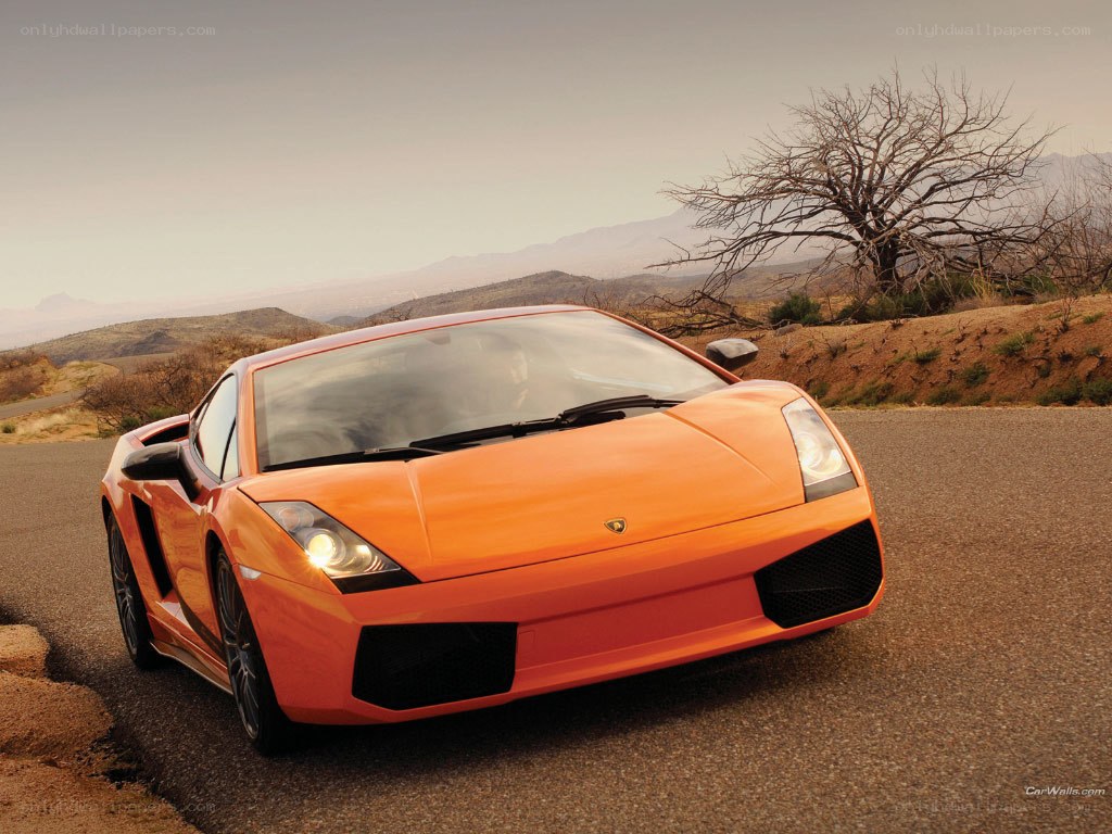 Orange Lamborghini on desert road