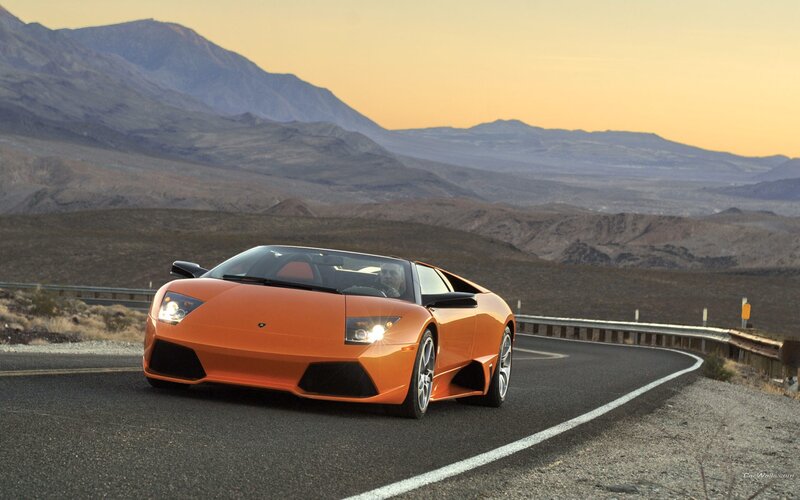 Orange Lamborghini on desert road