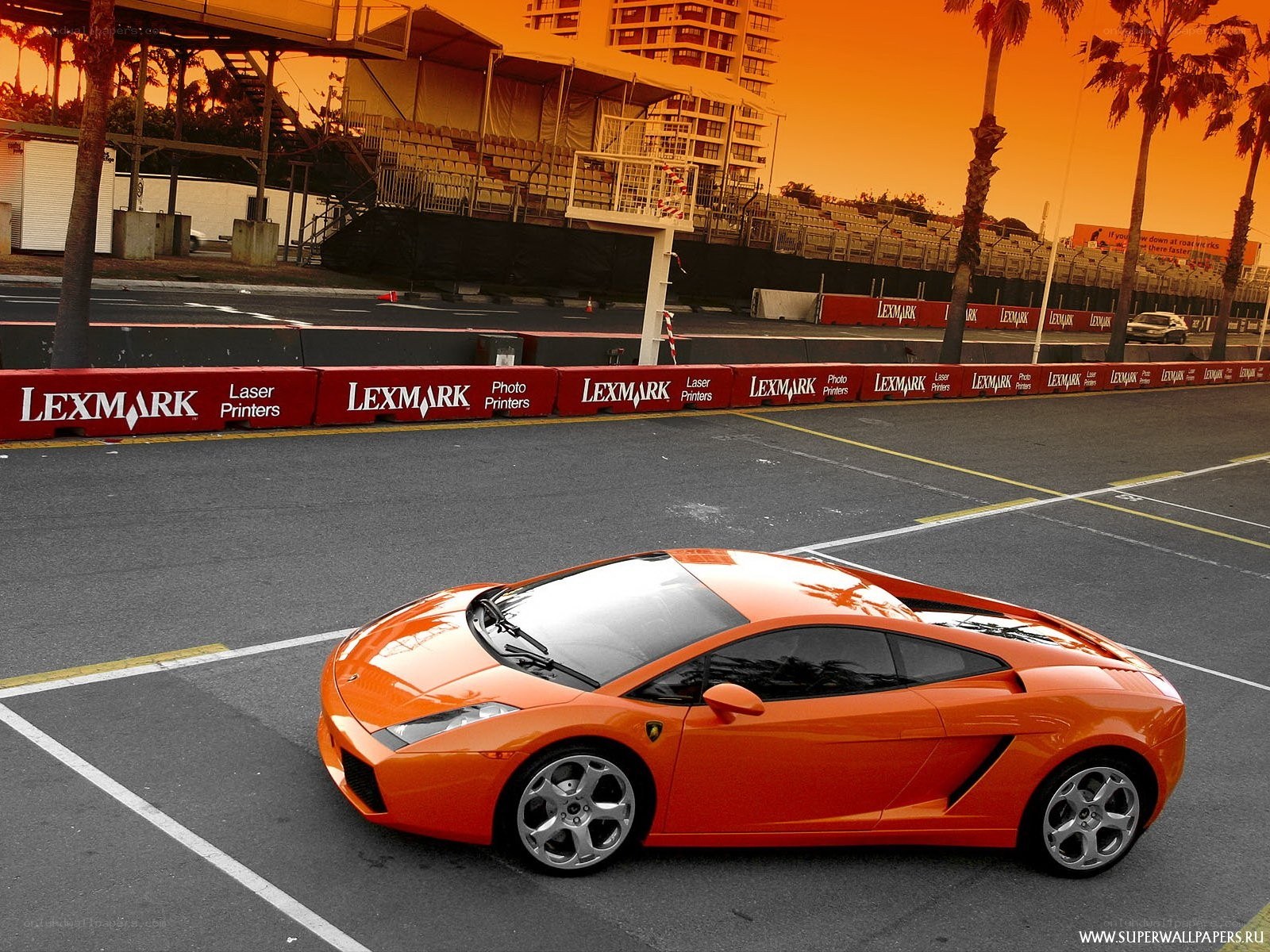 Orange Lamborghini on racetrack
