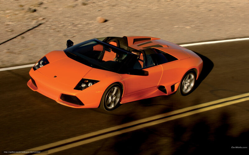 Orange Lamborghini on road