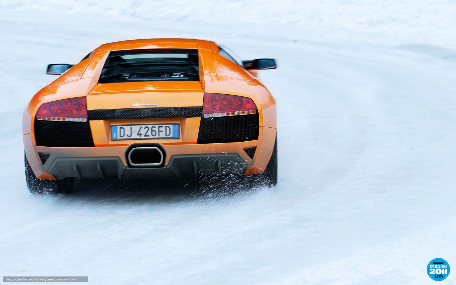 Orange Lamborghini on snow