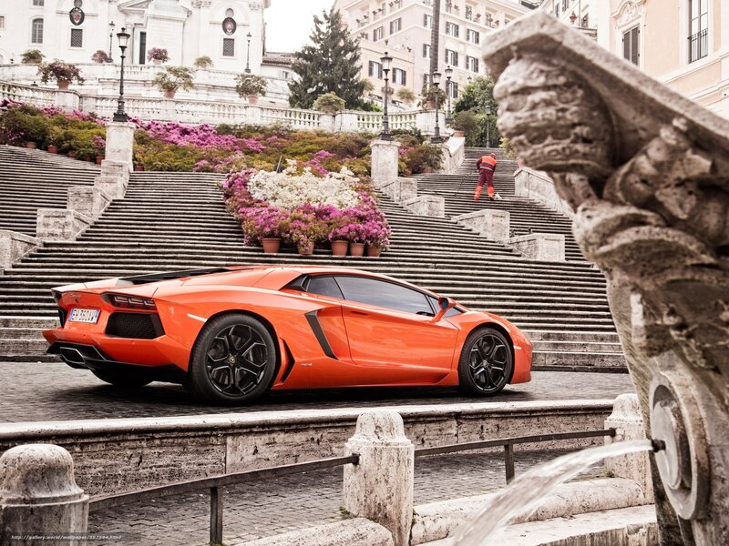 Orange Lamborghini on steps