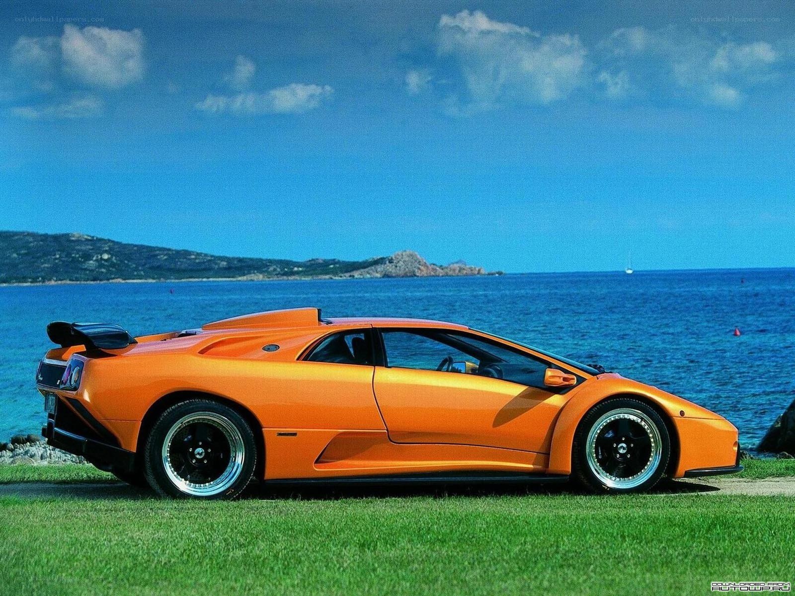 Orange Lamborghini on the coast
