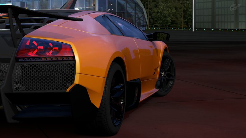 orange lamborghini on track