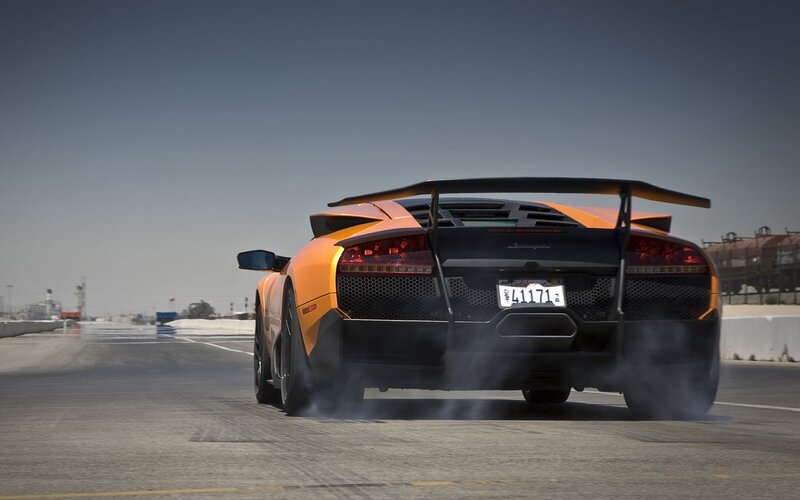 orange lamborghini on track