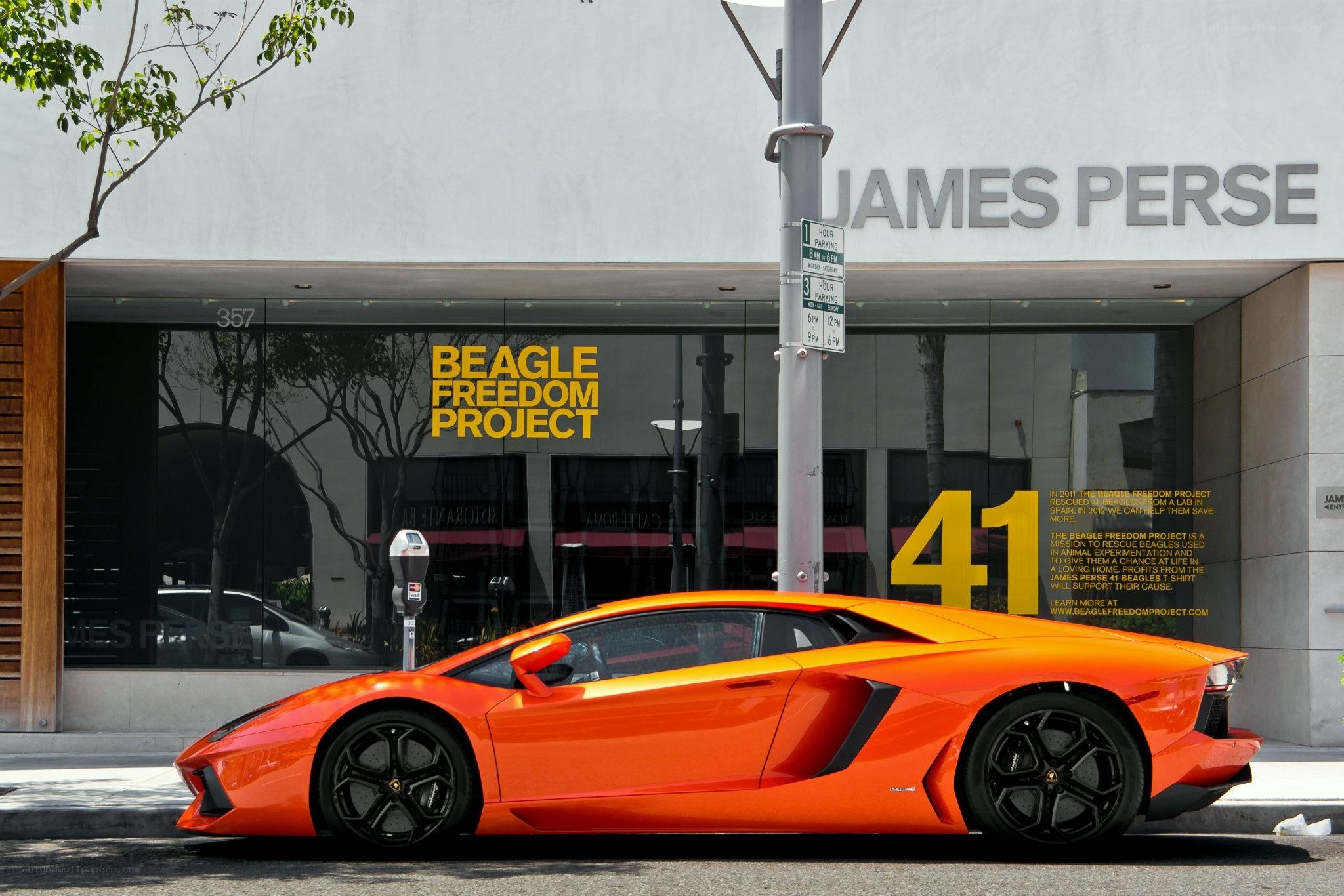 Orange Lamborghini parked on street