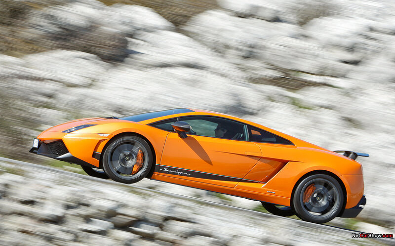 orange lamborghini speeding