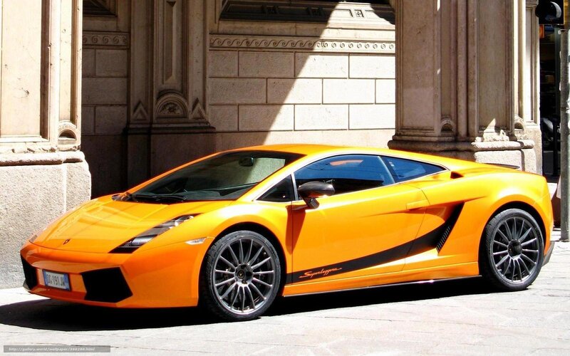 Orange Lamborghini Sports Car — Dramatic, Afternoon, Photograph, Building