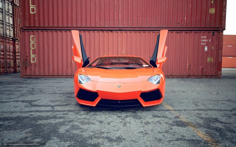 Orange Lamborghini Sports Car — Dramatic, Photograph, Red Shipping Containers