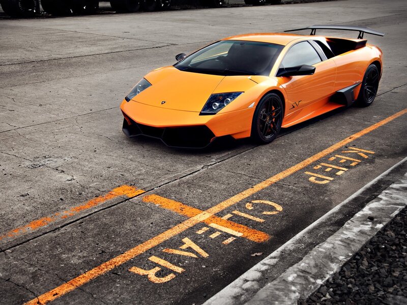 Orange Lamborghini Sports Car — Dramatic, Photograph