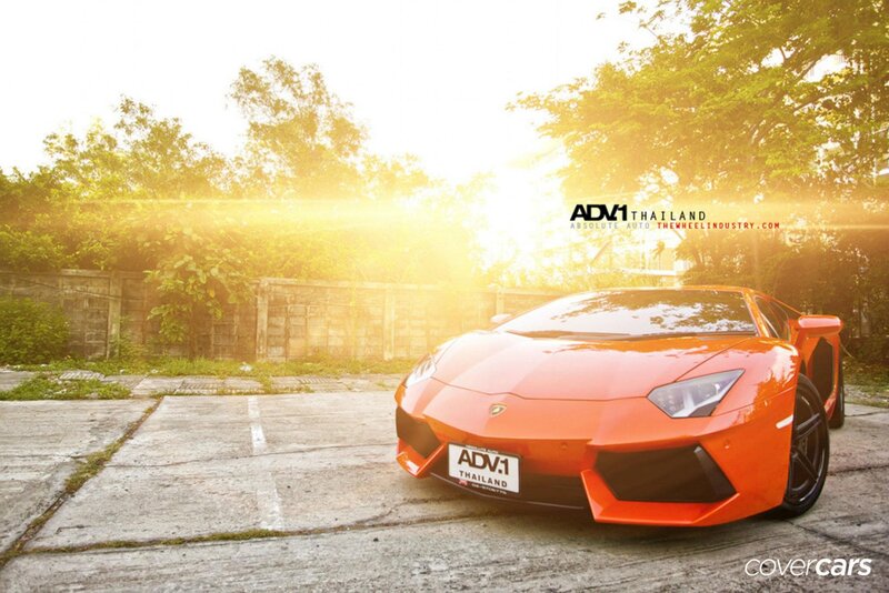 Orange Lamborghini Sports Car — Dramatic, Sunset