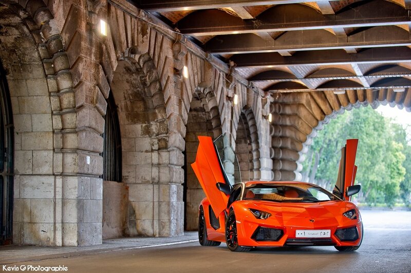 Orange Lamborghini under arches