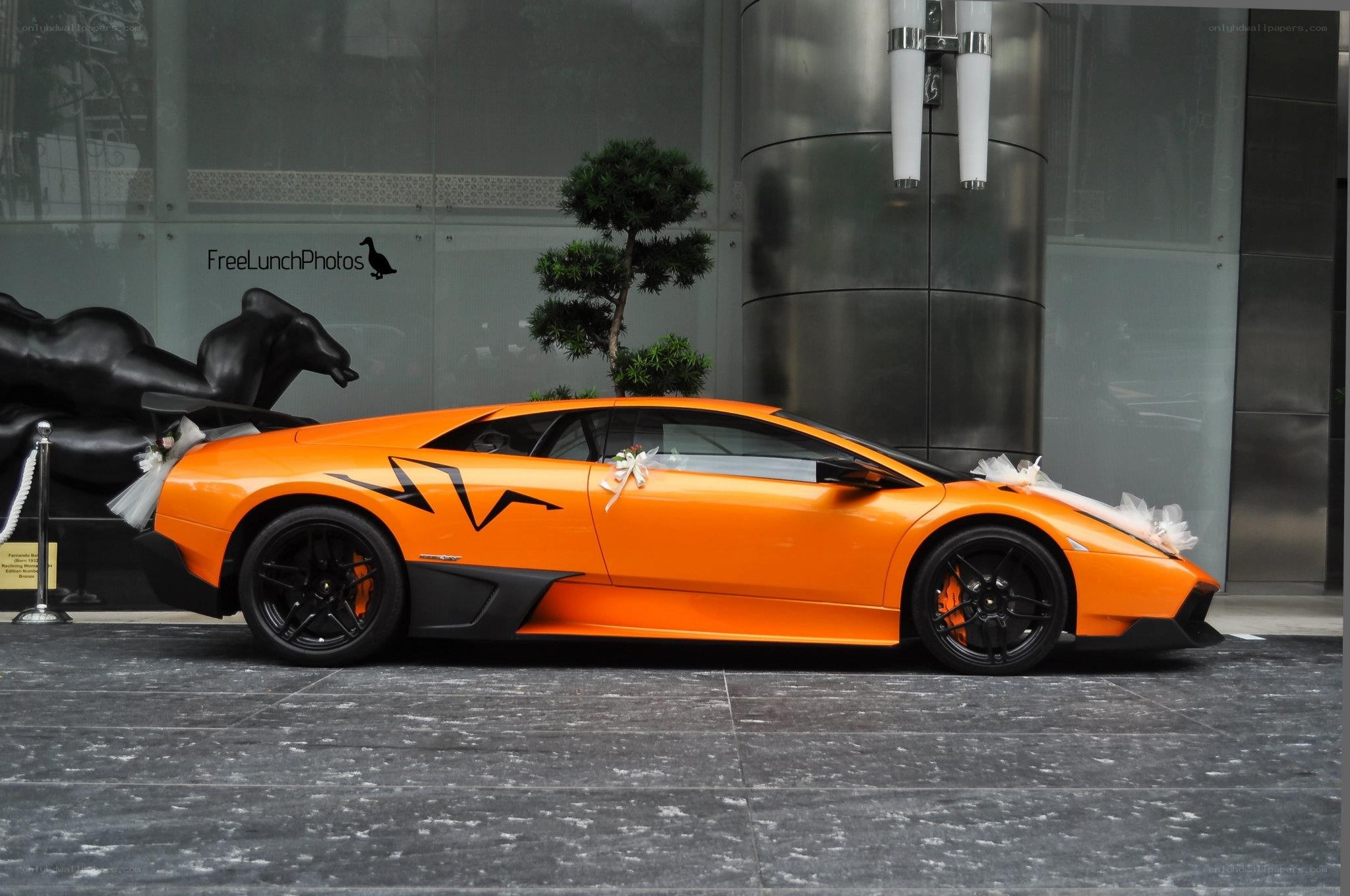 Orange Lamborghini wedding car