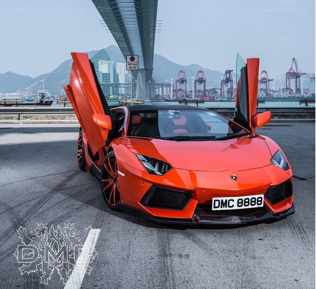 Orange Lamborghini with doors open