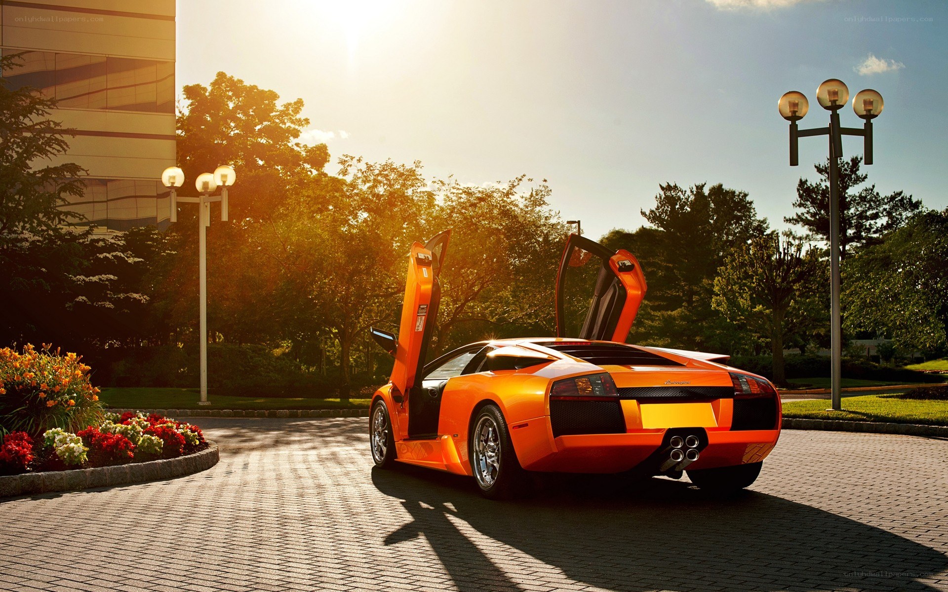 Orange Lamborghini with doors open