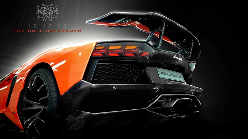 orange lamborghini with large spoiler