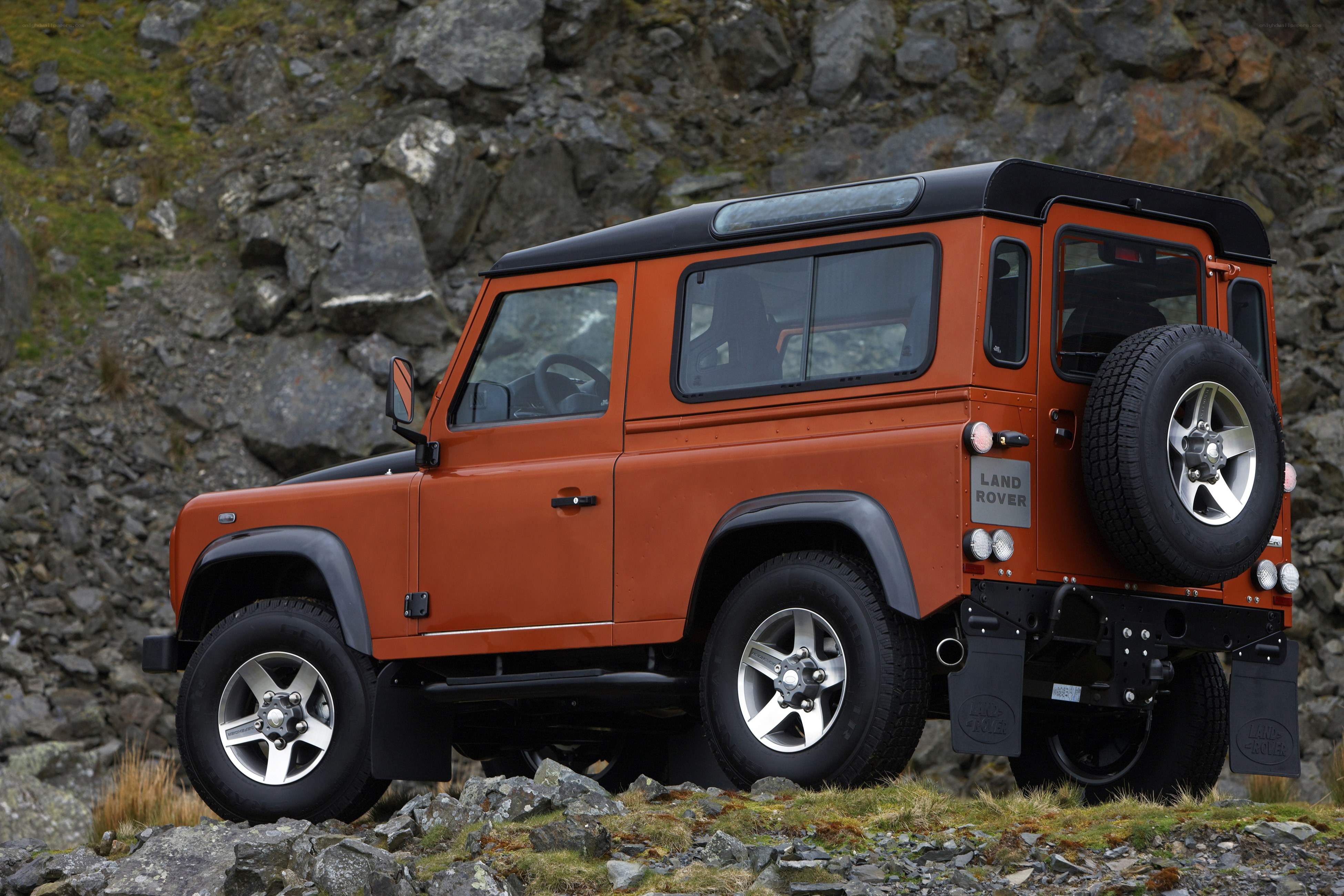 Orange Land Rover Defender