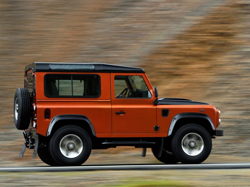 Orange Land Rover Defender — Dynamic, Photograph