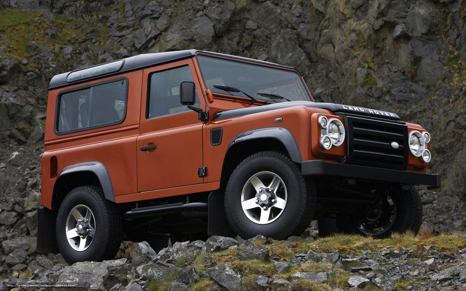 Orange Land Rover Defender