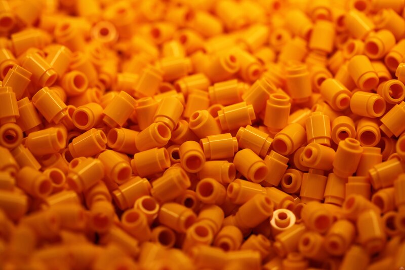 orange lego bricks pile