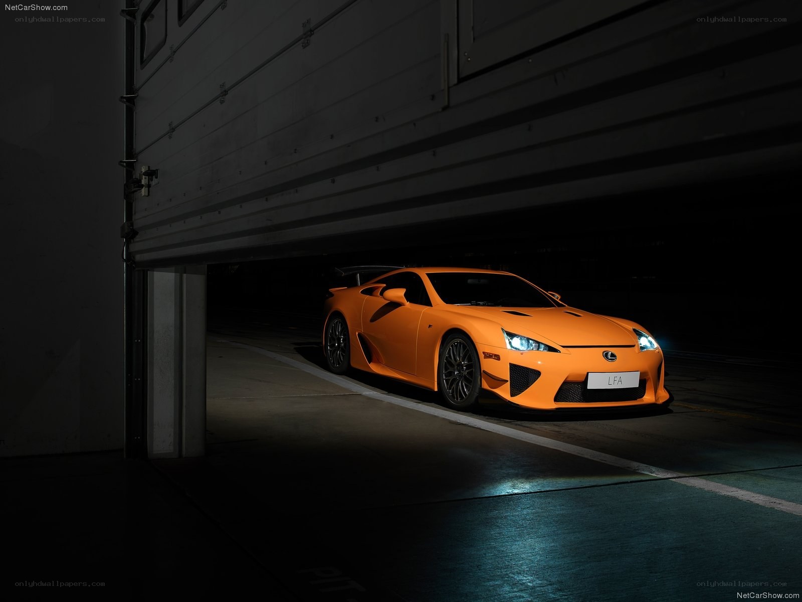Orange Lexus LFA in garage