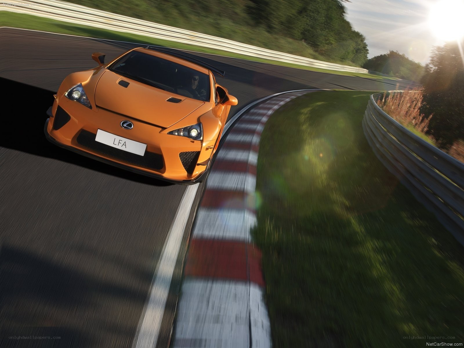 Orange Lexus LFA on a racetrack