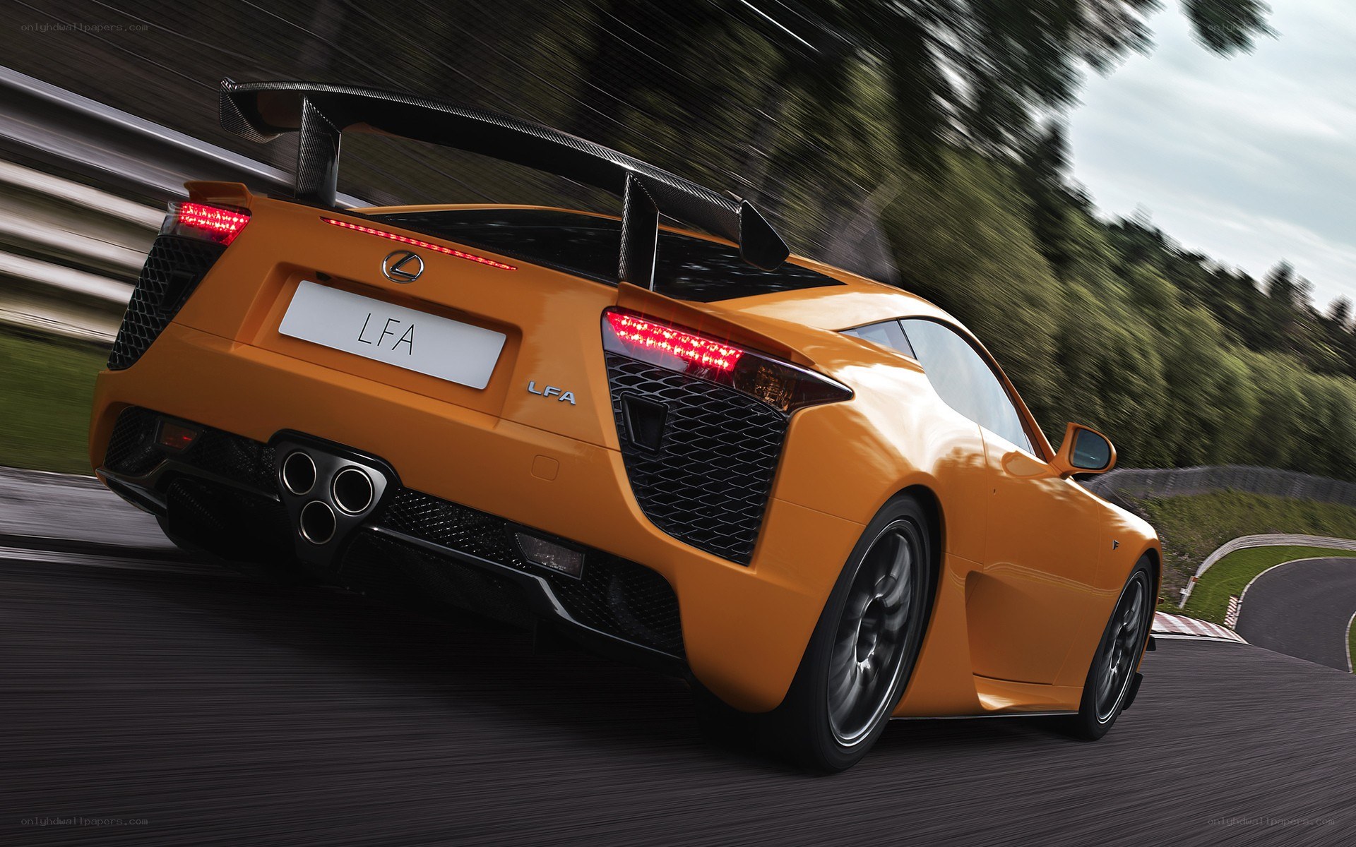 Orange Lexus LFA on racetrack