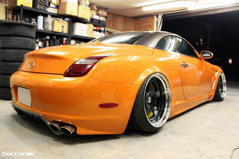 Orange Lexus SC430 in garage