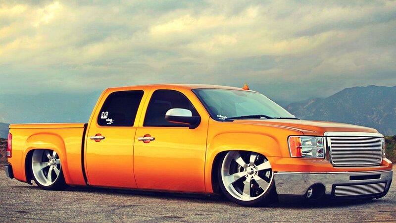 Orange Lifted Pickup Truck