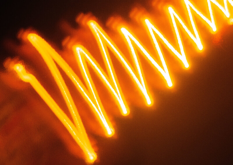 orange light trails in motion
