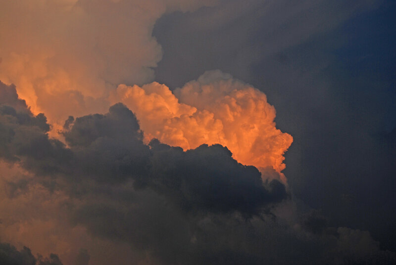 Orange-lit Storm Cloud