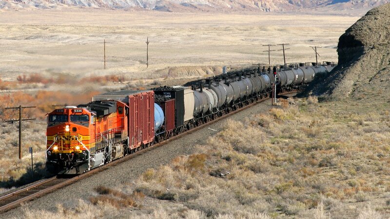 Orange Locomotive Train — Arid, Afternoon