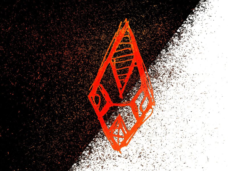 orange logo on textured background