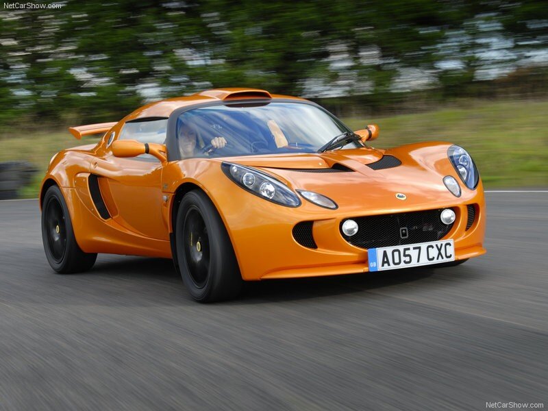 Orange Lotus Elise in motion