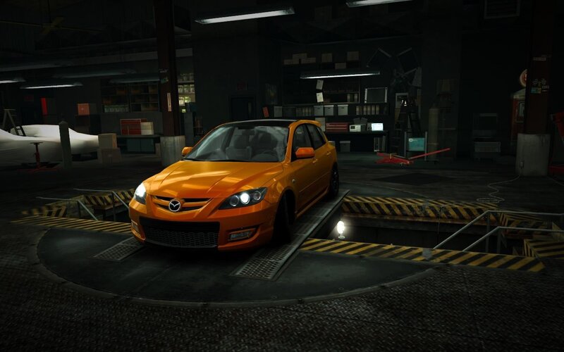 Orange Mazda Hatchback — Dark