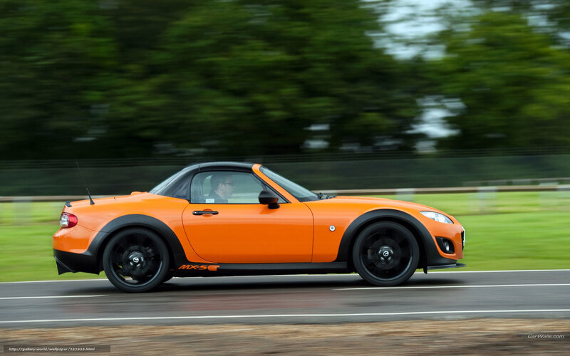 Orange Mazda MX-5 GT in motion