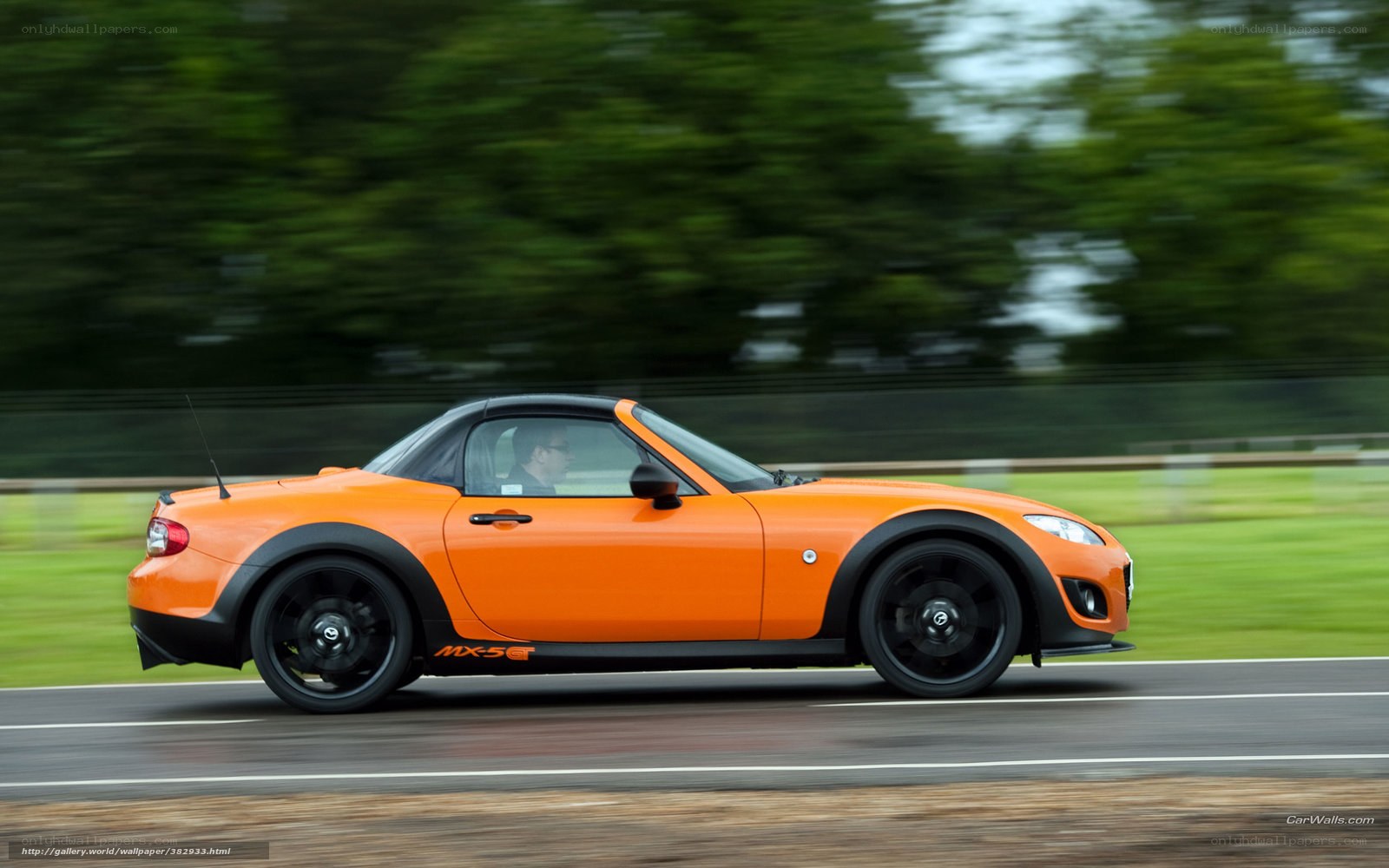 Orange Mazda MX-5 GT in motion