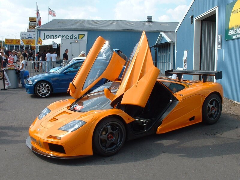 Orange McLaren F1 with doors open