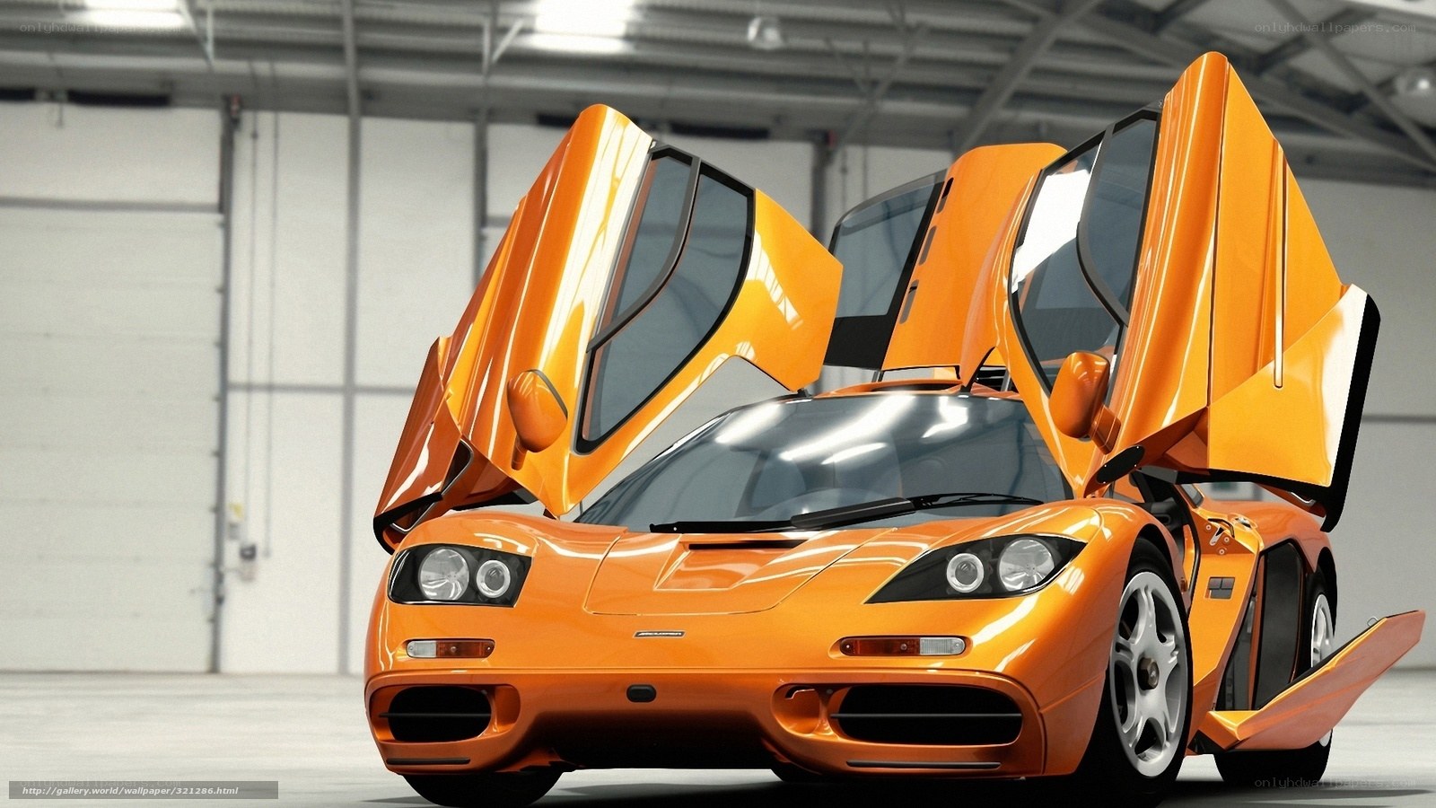 Orange McLaren F1 with doors open