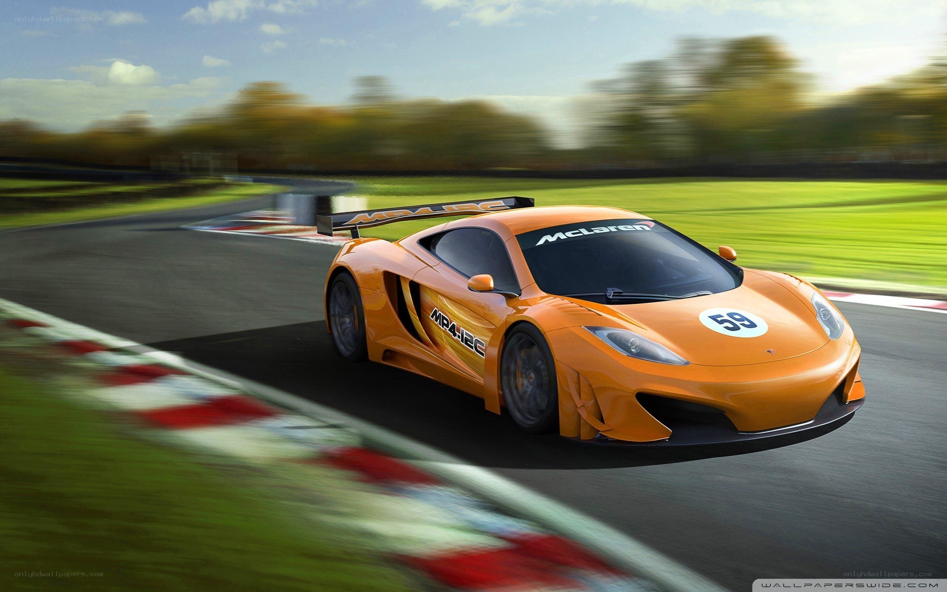 Orange McLaren on a racetrack