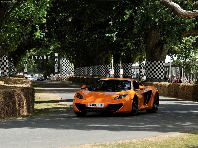 Orange McLaren on a track