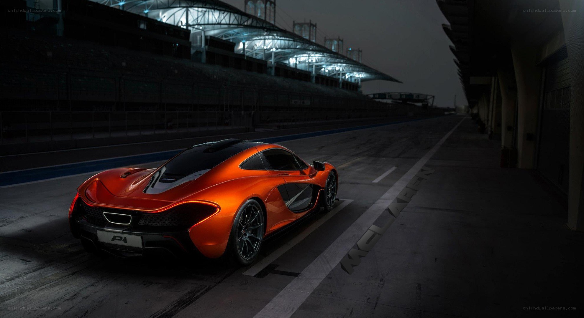 Orange McLaren P1 on racetrack