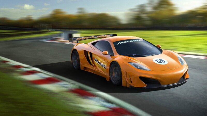 Orange McLaren race car on track